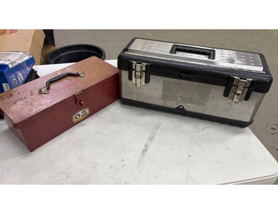 Two tool box’s with assorted tools, one red and on...