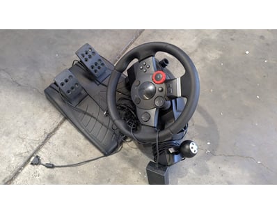 Logitech G27 Racing Wheel complete setup featuring...