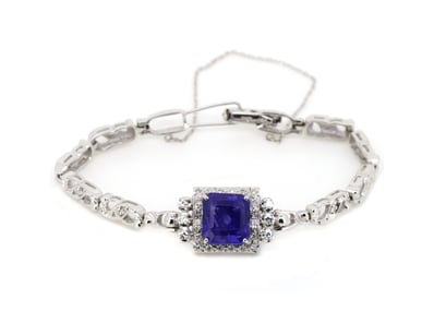 PT 950, 7.16CT TANZANITE AND DIAMOND, ART DECO INS...