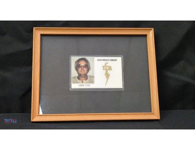 FRAMED LAMAR FIKE BACKSTAGE ID BADGE

Item Size: H...