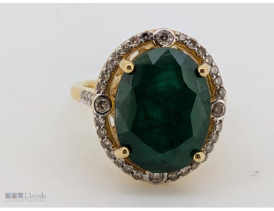 18CT YELLOW GOLD EMERALD AND DIAMOND RING

18Ct Ye...
