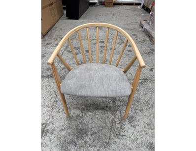 Natural timber armchair featuring a curved bentwoo...