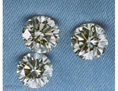 0.05 CARAT BROWN 3 ROUND DIAMOND         

Conditi...