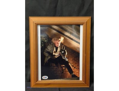 AUTOGRAPHED PHOTOGRAPH OF CHRISTOPHER LLOYD.

Item...