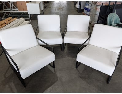Set of four contemporary accent chairs featuring a...