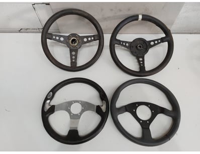 Car steering wheel collection comprising four clas...