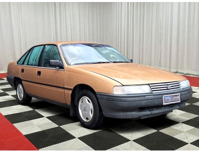 <b>1990 Holden Commodore VN Sedan - Gold - 219,702...