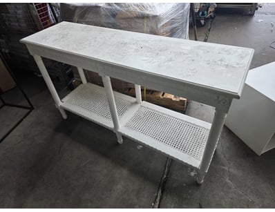 White console table featuring a clean, contemporar...