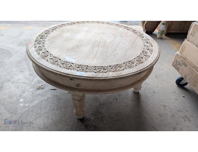 Elegant round timber coffee table featuring with a...