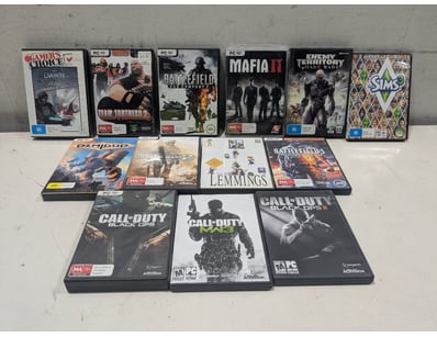 PC gaming collection featuring, Call of Duty, Mafi...