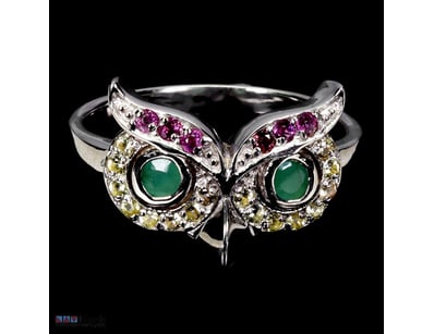 NATURAL EMERALD & SAPPHIRE OWL RING.     

Natural...