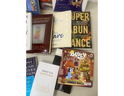 Box of mixed books on Christianity, children’s boo...