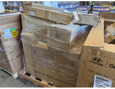 Large pallet containing genuine automotive parts f...