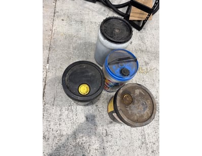 Lot comprising four industrial lubricant container...