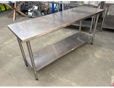 Commercial-grade stainless steel work table with u...
