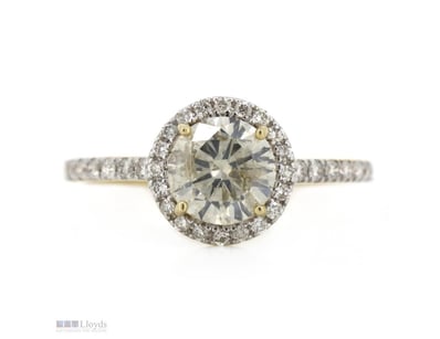 14K YELLOW GOLD AND DIAMOND, HALO RING.      

The...