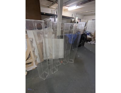 Lot of clear acrylic display stands and shelving u...