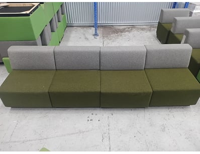 Modular seating system comprising four upholstered...