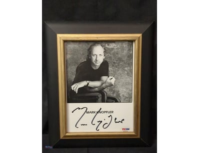 AUTOGRAPHED PHOTOGRAPH OF MARK KNOPFLER.

Item Siz...