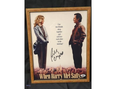 THIS IMAGE SHOWS A FRAMED, AUTOGRAPHED MOVIE POSTE...
