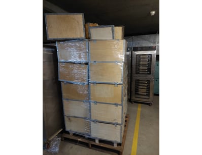 Large industrial pallet-mounted shipping crate con...