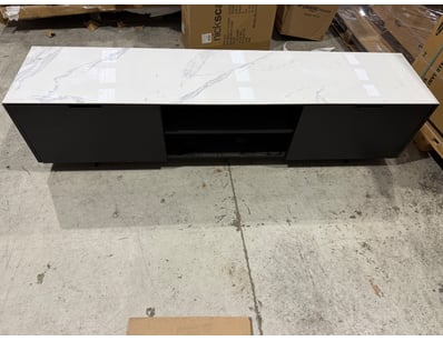 Modern entertainment unit featuring a sleek black ...