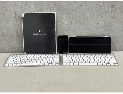 Apple accessories including iPad case and keyboard...