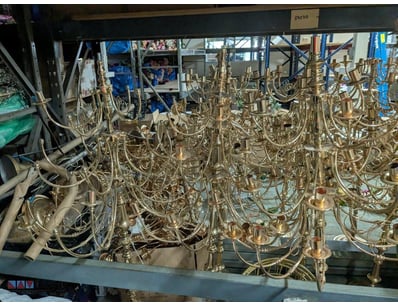 Substantial collection of brass chandeliers featur...