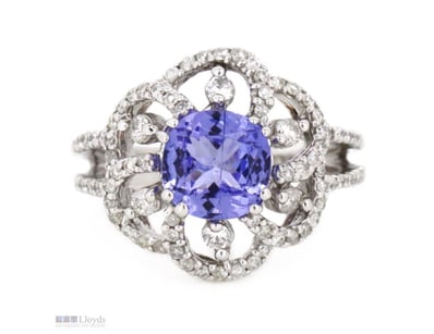 14K WHITE GOLD, TANZANITE AND DIAMOND, FLORAL RING...