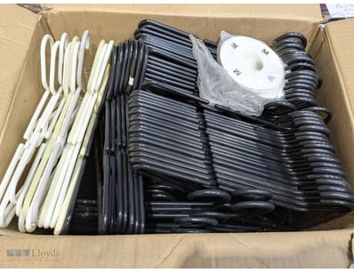 Hangers, plastic black and white, qty to box 

Sol...