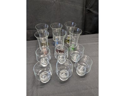 COLLECTION OF SIX COLOURED GLASS STEMWARE AND SIX ...