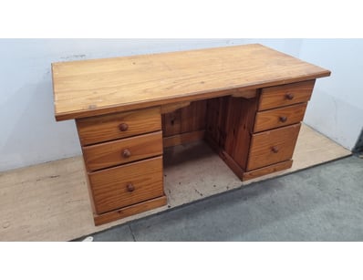 Solid timber desk featuring a traditional design w...