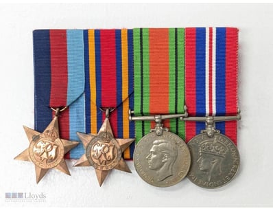 WWII MEDAL GROUP WITH CLASP AND BREAST BADGE

Item...