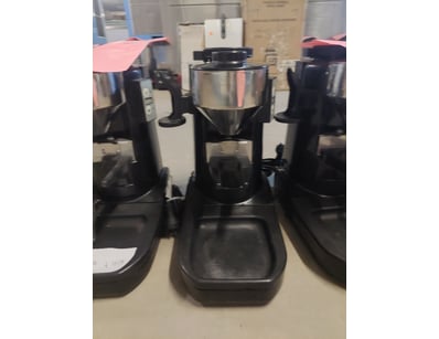 Lot of commercial coffee grinders featuring CBI It...