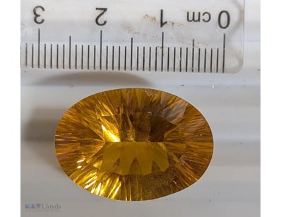 LARGE COLOR ENHANCED 26 CARAT CITRINE GEMSTONE

No...
