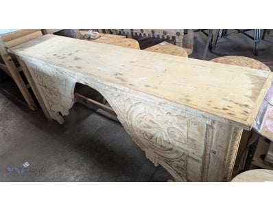 Carved timber hall table featuring an ornately han...