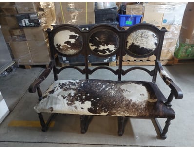 Striking three-seat bench featuring a dark wooden ...