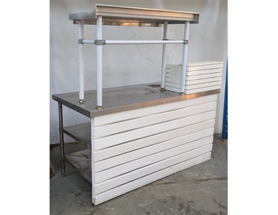 Commercial food service counter featuring a white ...