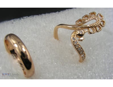 GOLD COLOUR RINGS SIZES 7        

Condition: Good...