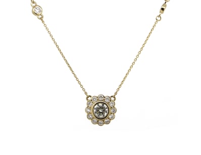 14K YELLOW GOLD AND DIAMOND, NECKLACE.      

The ...