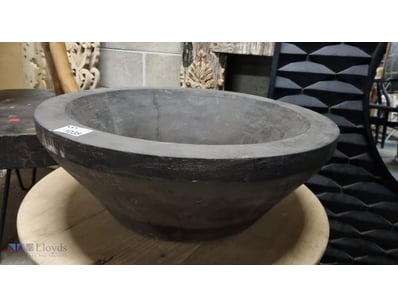 Charcoal-grey Timber bowl featuring a minimalist d...