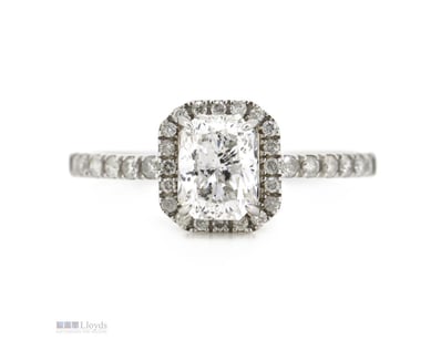 14K WHITE GOLD AND DIAMOND, HALO RING.      

The ...