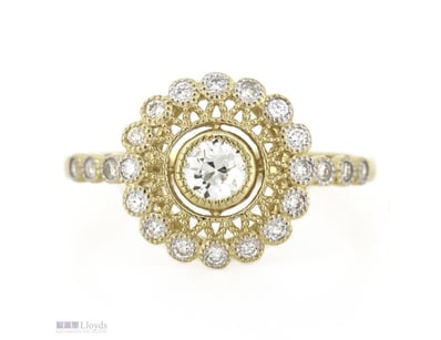 14K YELLOW GOLD AND DIAMOND, HALO RING.      

The...