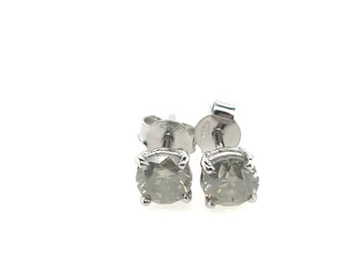 18CT WHITE GOLD (XRF TESTED) DIAMOND EARRINGS

Fea...