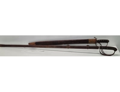 PAIR OF ANTIQUE MILITARY SABRES WITH BRASS HILTS A...