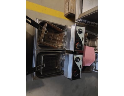 Pair of Roband commercial deep fryers featuring st...