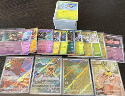 ASSORTED JAPANESE BULK POKEMON CARDS INCLUDING HOL...