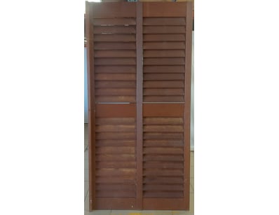 wooden blinds featuring horizontal slat design wit...