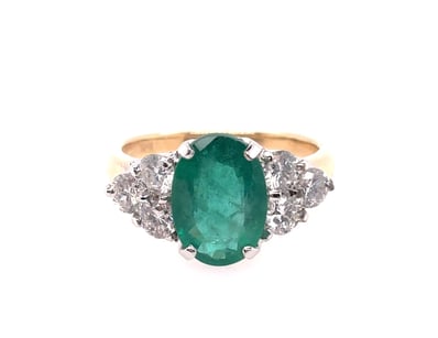 18CT YELLOW AND WHITE GOLD EMERALD AND DIAMOND RIN...