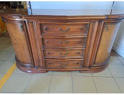 Timber sideboard featuring curved barrel-shaped en...